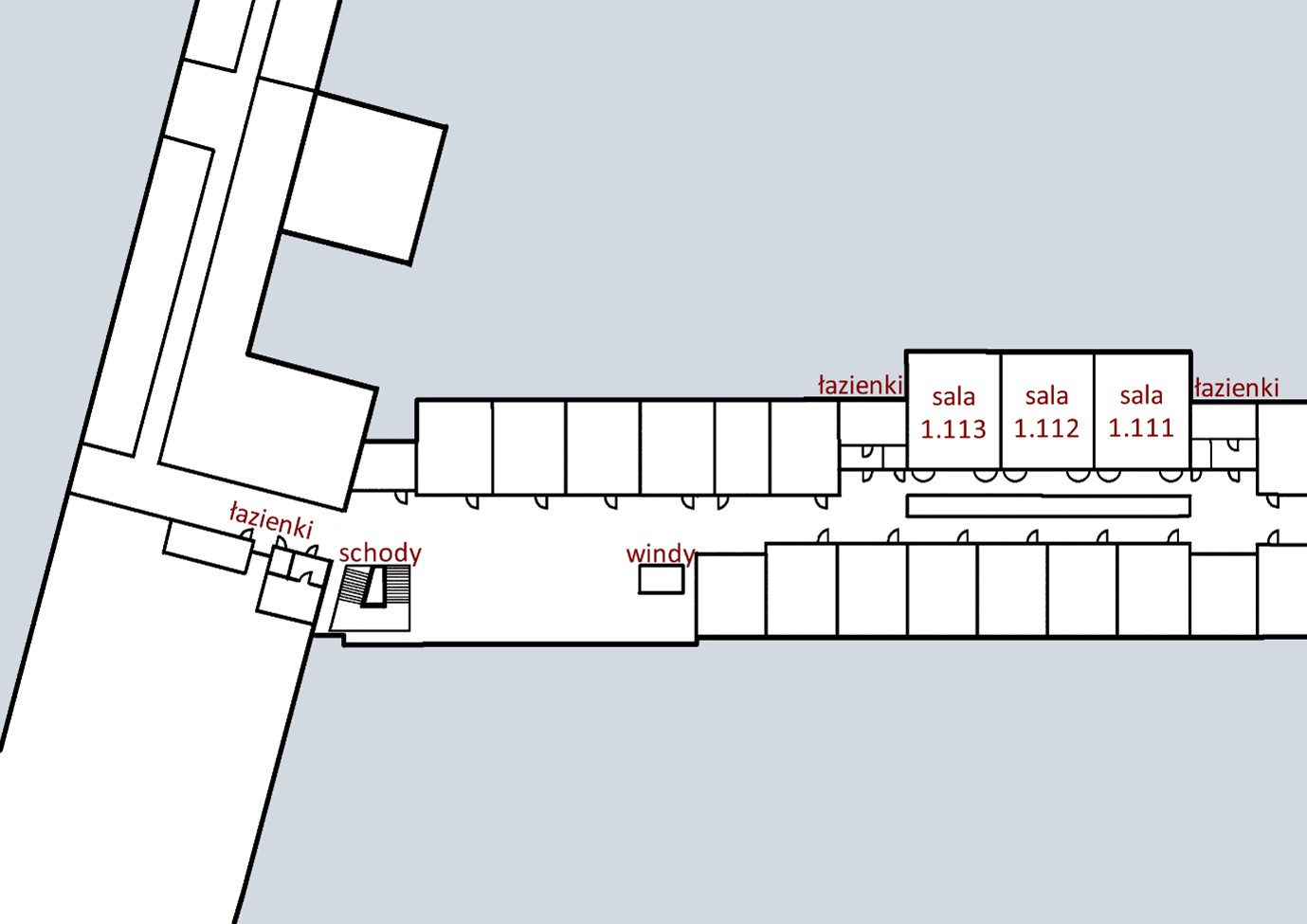 Mapa 1. piętra z oznaczonymi łazienkami, schodami, windami i salami 1.113, 1.112, 1.111.